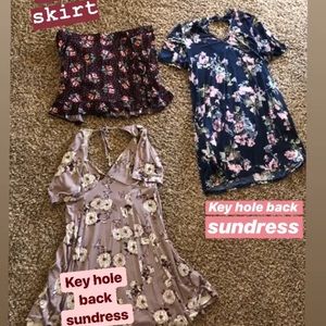 1 wrap skirt. 2 sundresses.